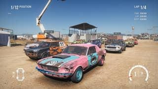 A long line of cars line up ready to race.